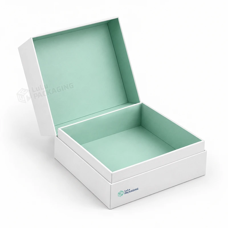White hinged flip lid rigid box with a mint green interior and the lid open, with the LuLu Packaging logo