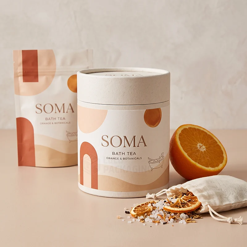 Cream bath tea paper tube and matching pouch with dried orange and a muslin bag