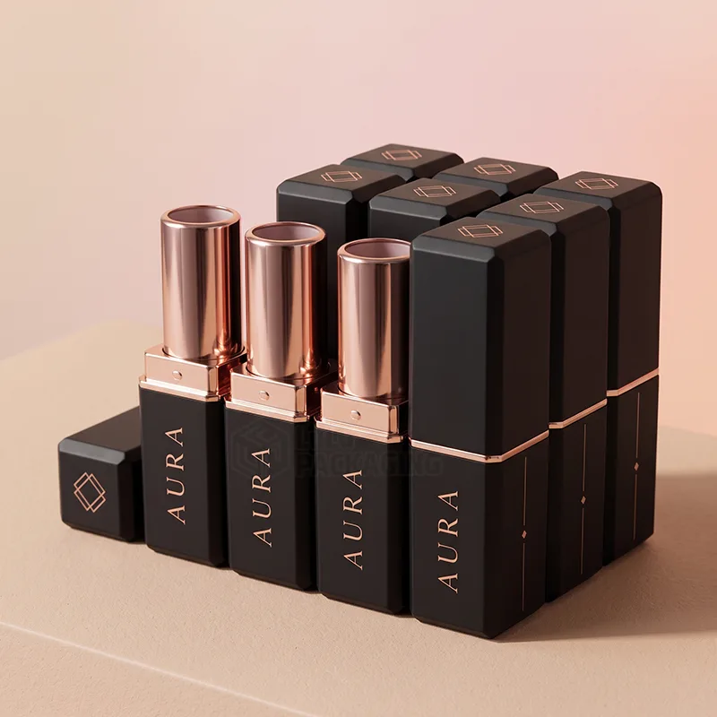 Group of matte black lipstick tubes with rose gold inner cases and printed lettering