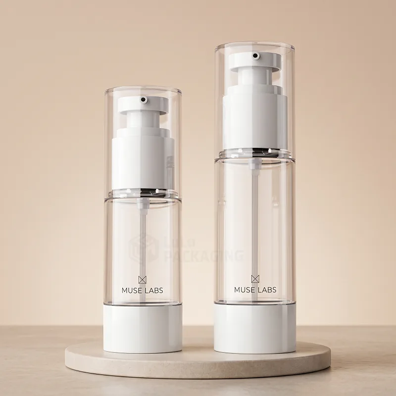 Two clear airless pump bottles with white pumps and bases, printed with a simple logo