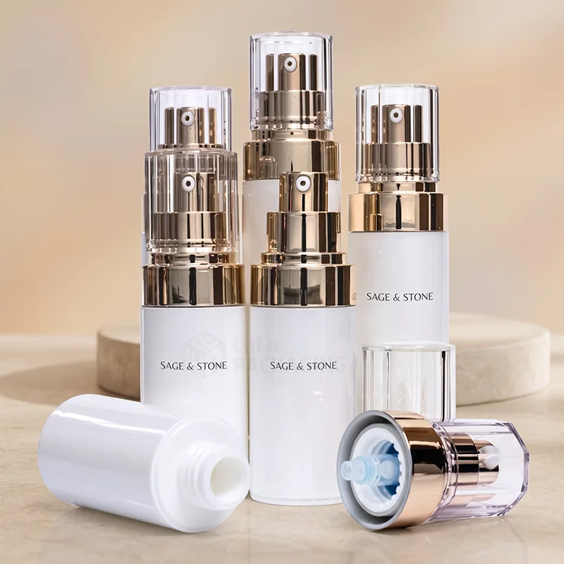 White airless pump bottles in different sizes with rose gold pumps and clear overcaps