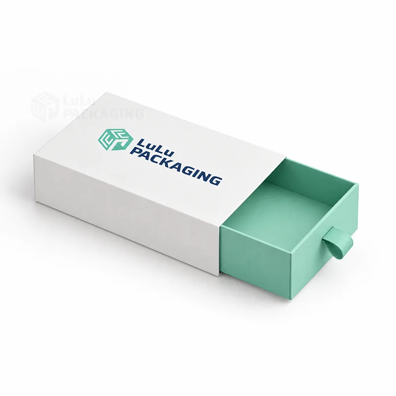 White printed drawer box with a mint tray half pulled out by a ribbon pull tab