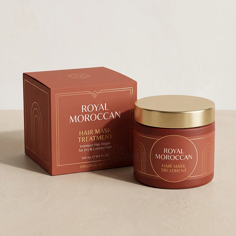 Terracotta hair mask box with gold foil details next to a matching jar with a gold lid