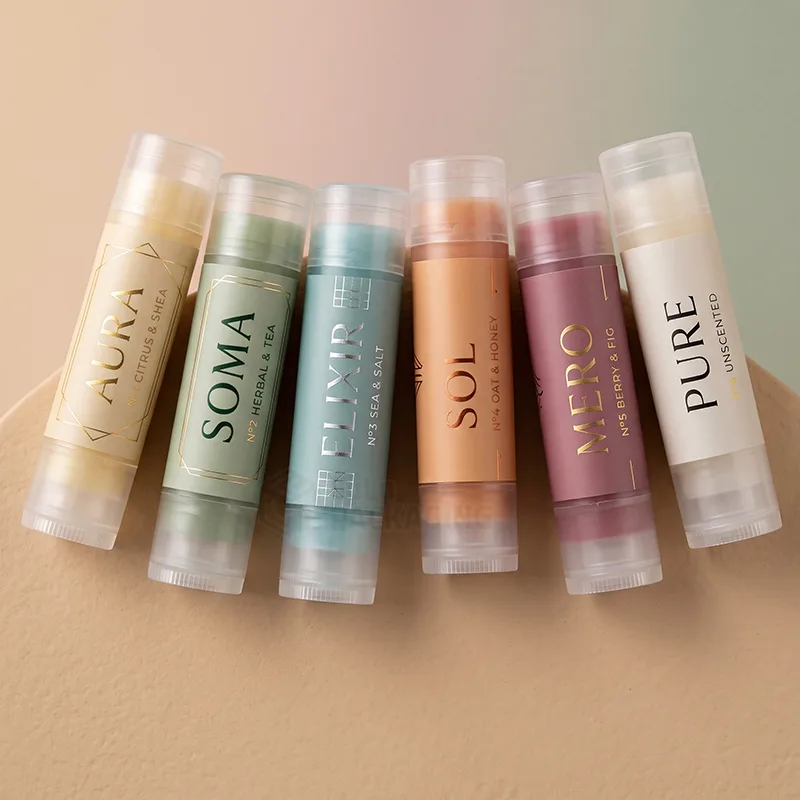 Six clear lip balm tubes with colourful printed labels in a row