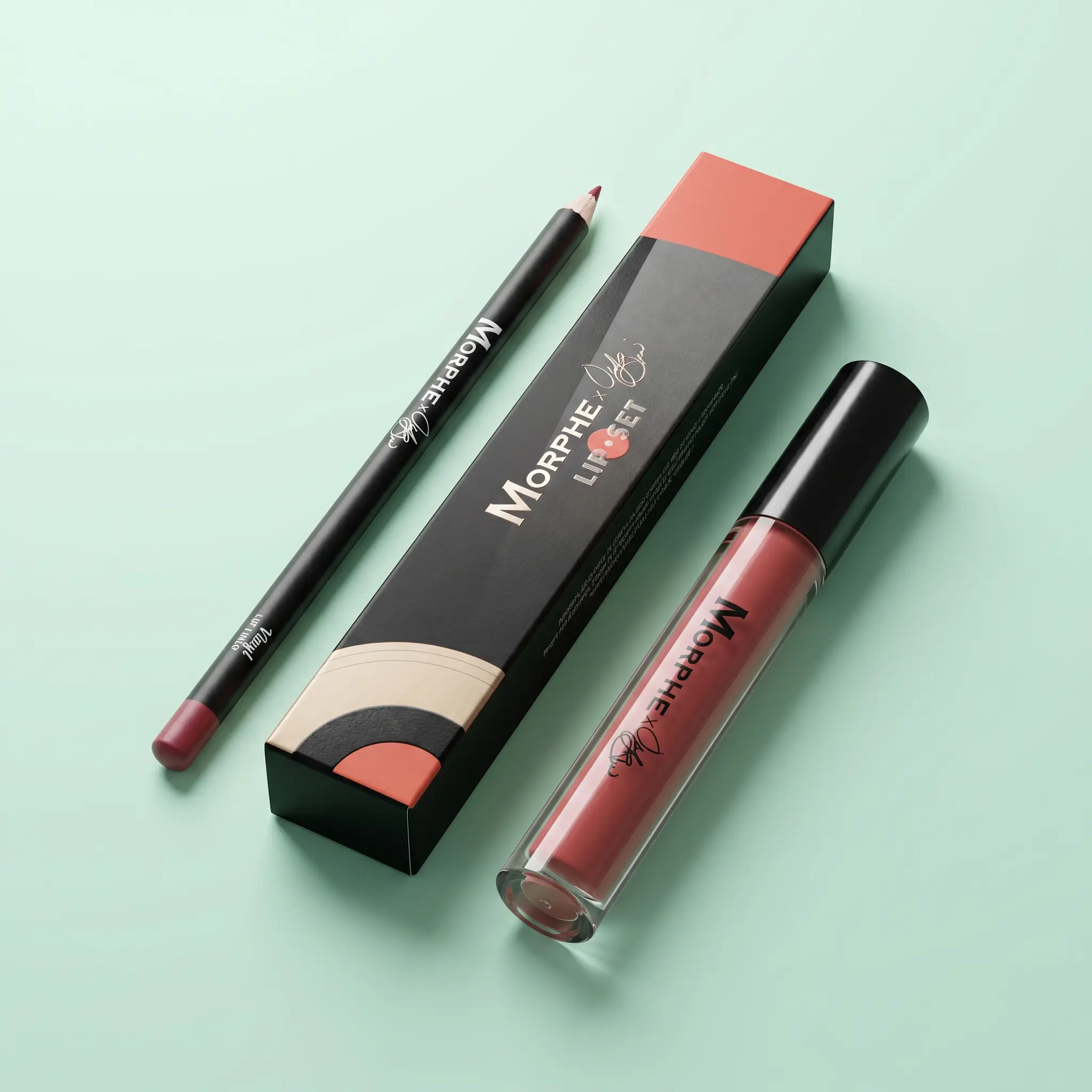 Morphe lip liner and liquid lipstick next to a matching black and coral box on a mint-green background.