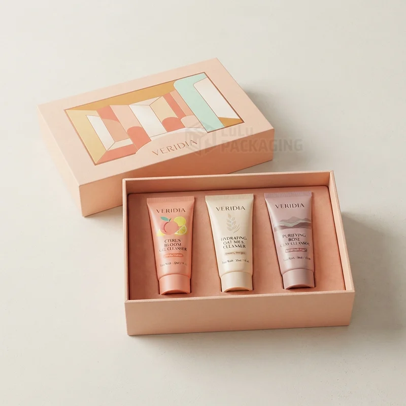 custom printed face wash boxes in pink rigid box holding three cleanser tubes