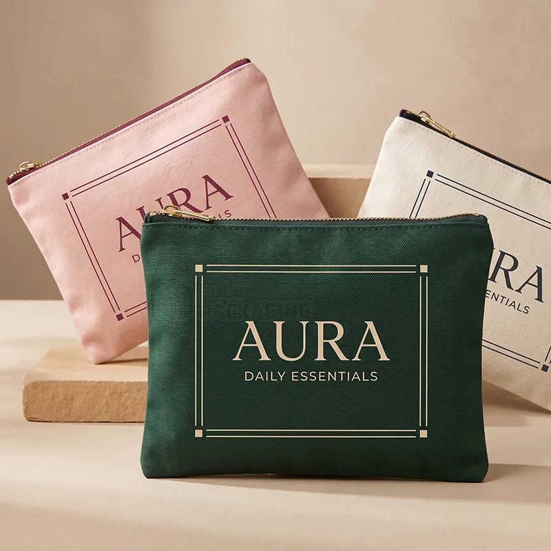 Canvas zipper pouches in green, pink and natural with printed logos