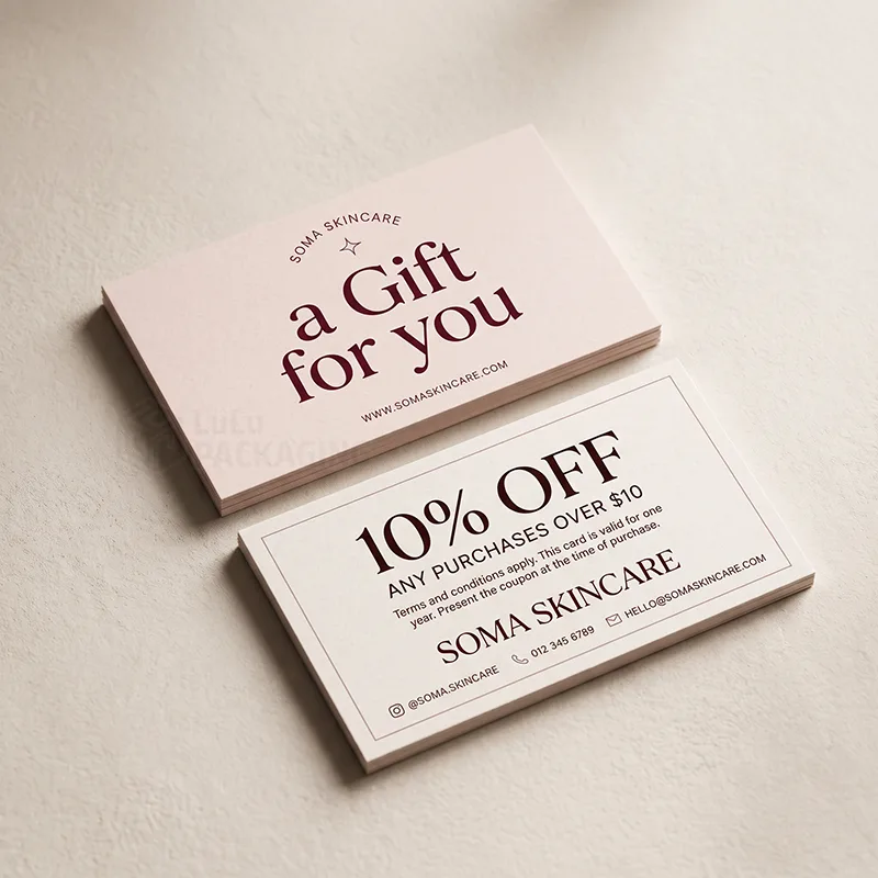 Two stacks of cream cards, one reading 'a Gift for you', the other 10% off any purchase over $10