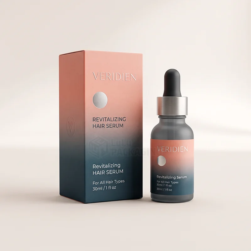 Coral to navy gradient hair serum box with a matching frosted dropper bottle