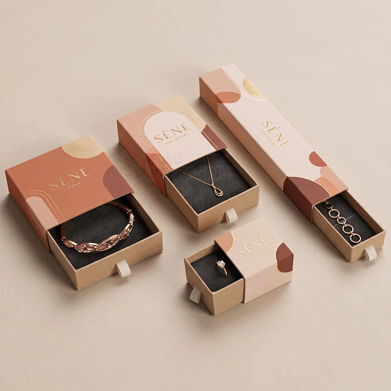 Set of printed drawer boxes for a pendant, ring and bracelets with black velvet trays