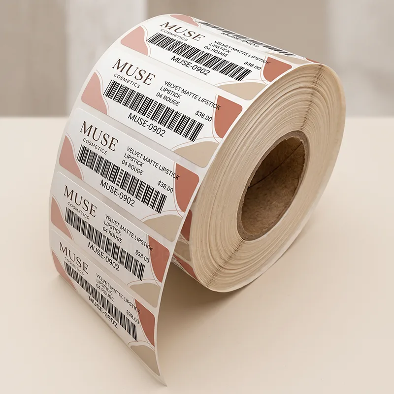Roll of printed retail barcode labels showing product name, shade, SKU and price for a lipstick