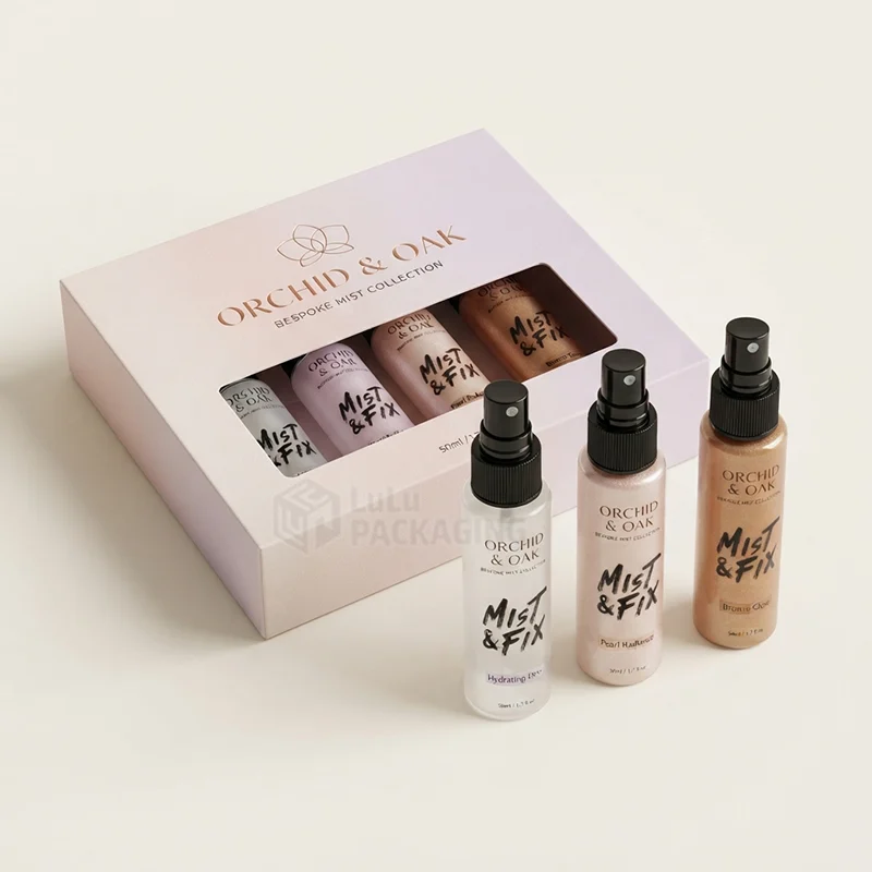 Lilac collection box with a window showing four mist bottles, three standing in front