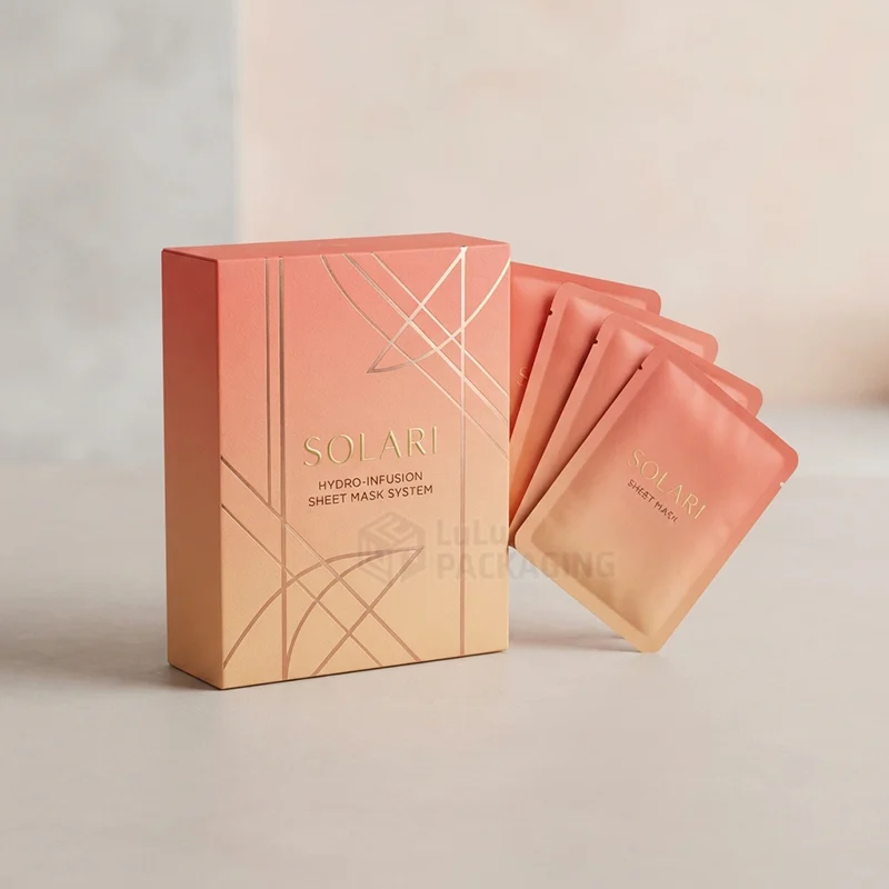 sheet mask packaging in peach gradient with foil lines and sachets
