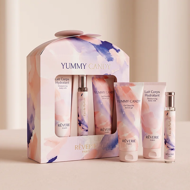 Watercolour print gift box with handle and window holding shower gel, body milk and perfume