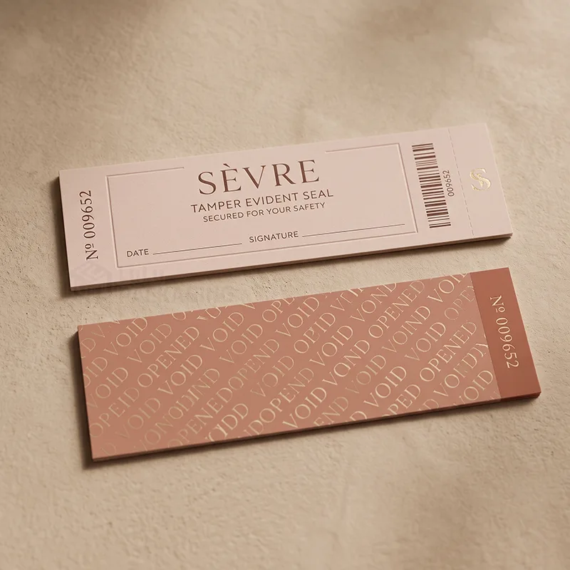 Cream numbered tamper evident seal with date and signature lines beside a terracotta seal printed with VOID OPENED